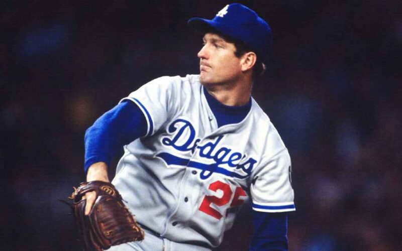 Tommy John pitching in a Los Angeles Dodgers uniform